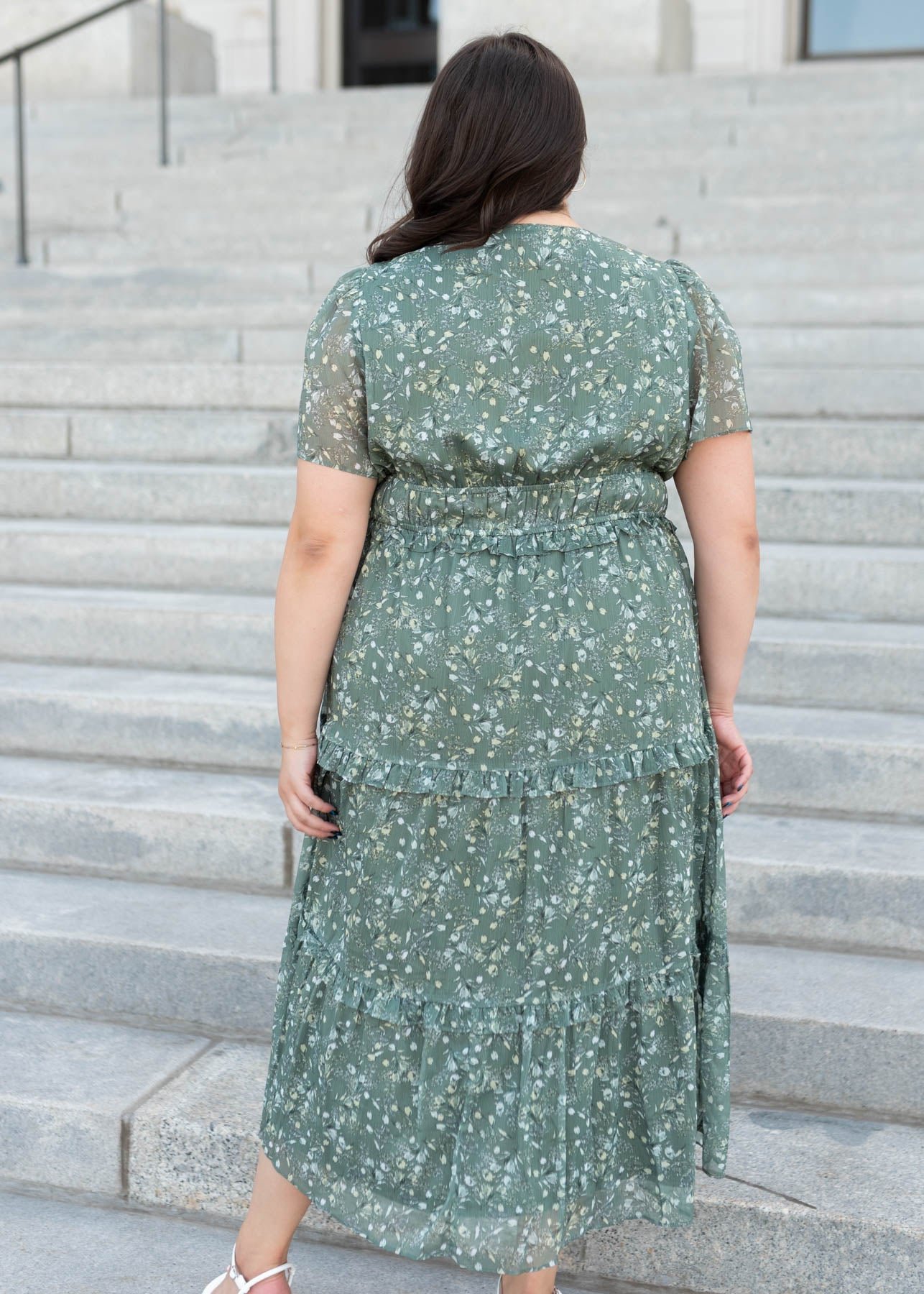 Back view of the sage floral dress in plus size