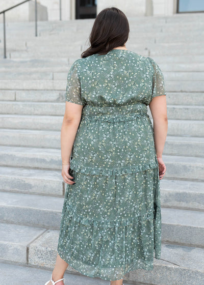 Back view of the sage floral dress in plus size