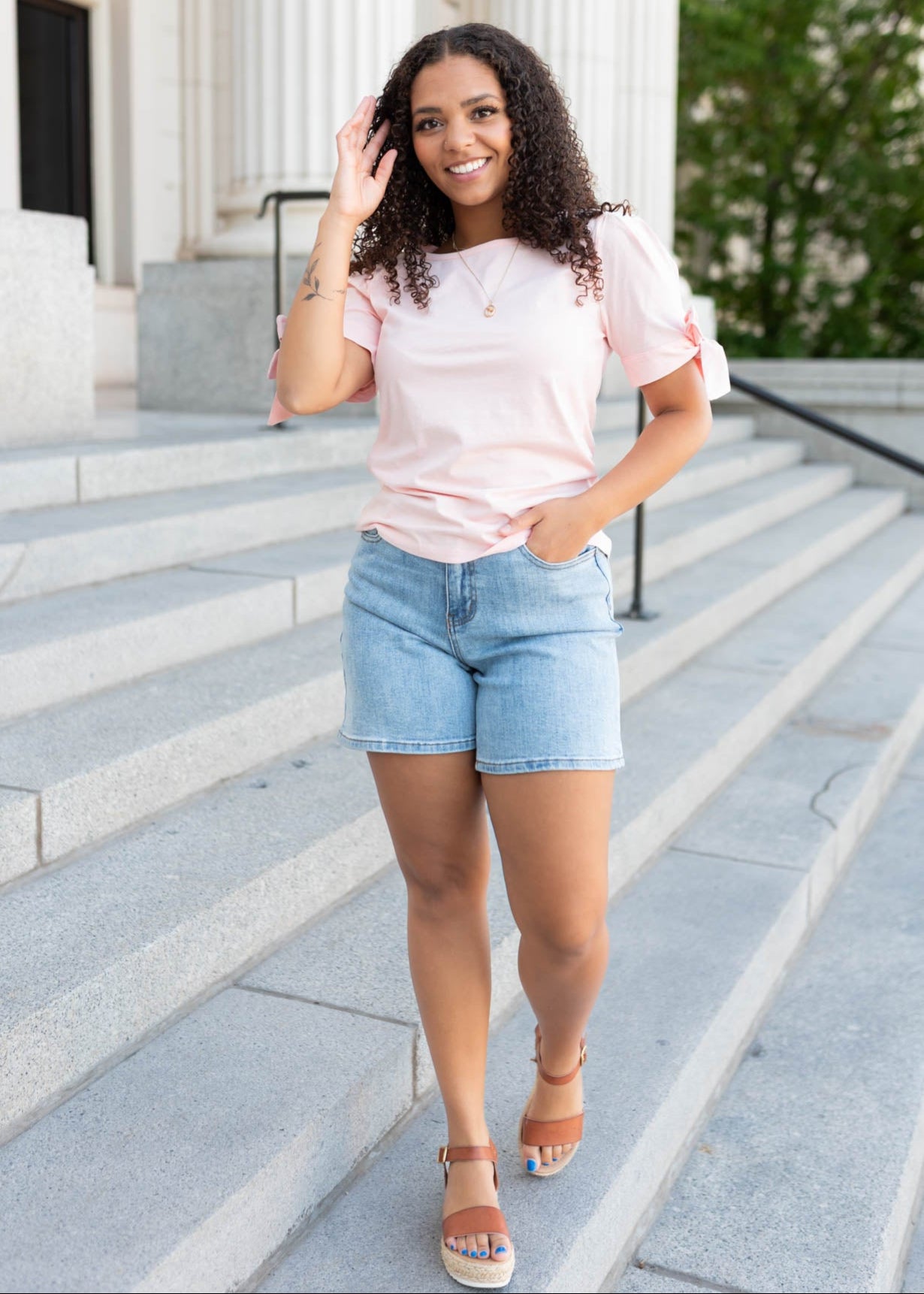 PInk bow top with short sleeves