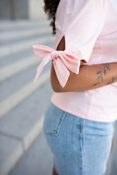 Pink bow top