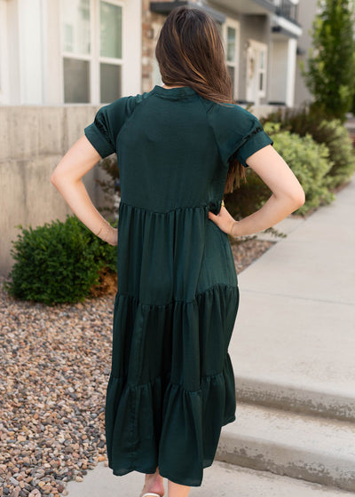 Back view of the dark green satin dress