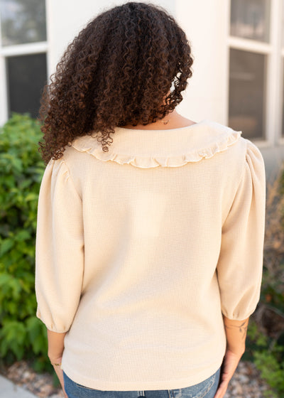 Back view of the natural collared top