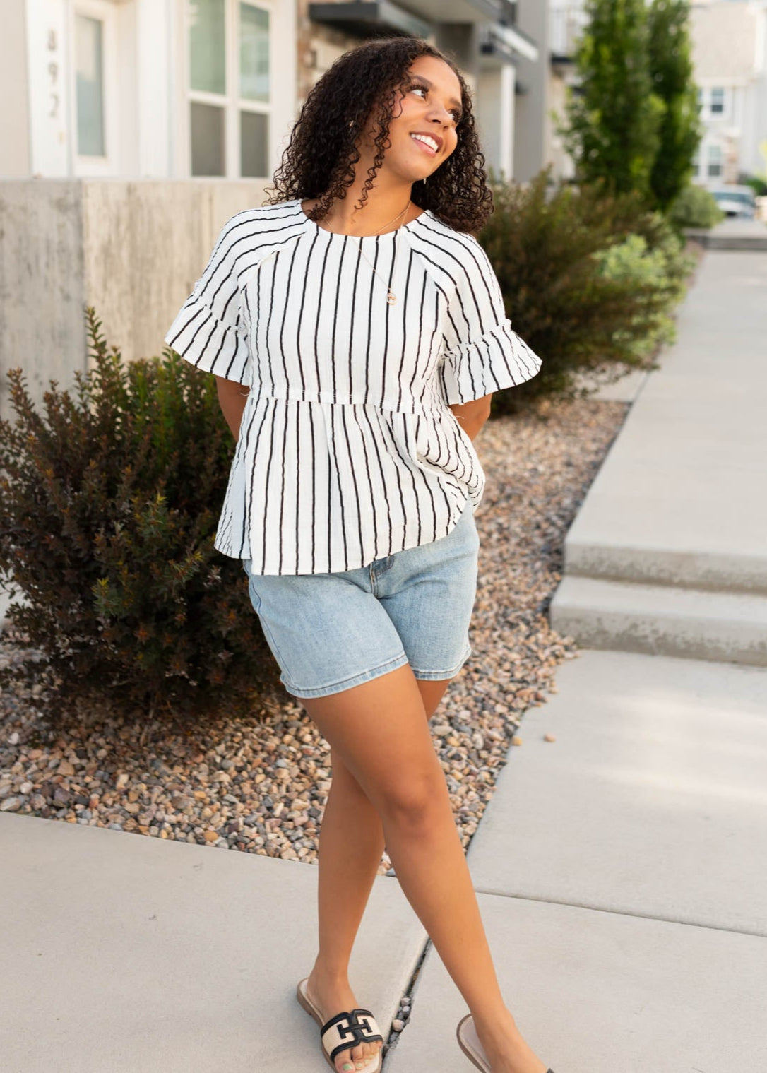 Short sleeve modest black striped peplum top