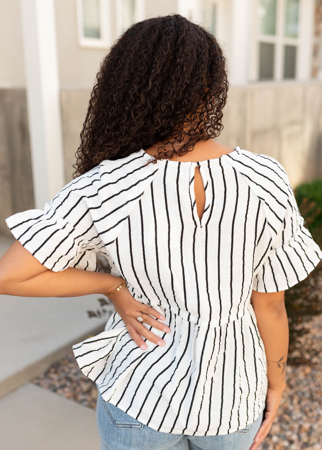 Back view of the stripe peplum top
