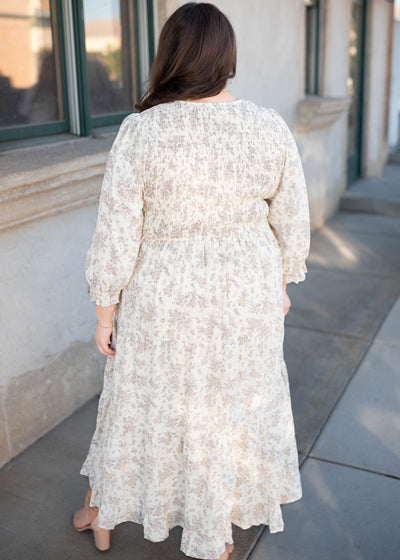 Back view of the plus size ivory floral dress