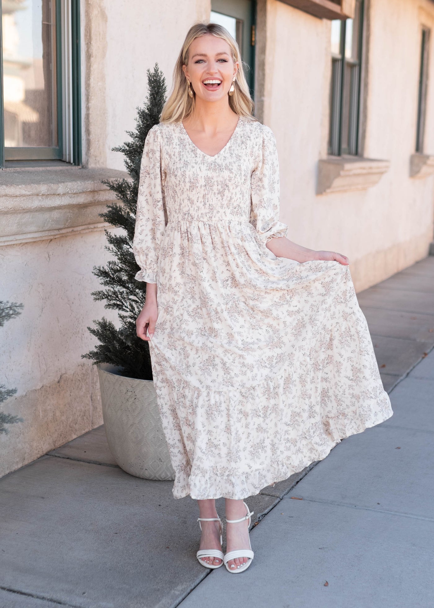 Modest ivory floral dress with long sleeves and smocked bodice