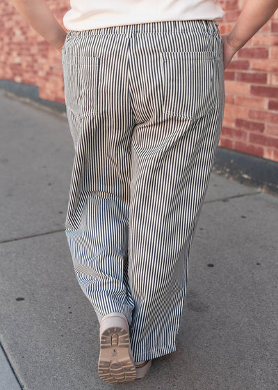 Back view of the plus size navy pinstripe pants