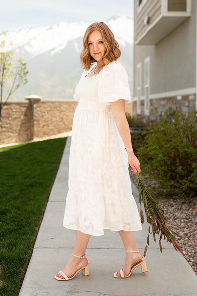 White dress with smocked bodice