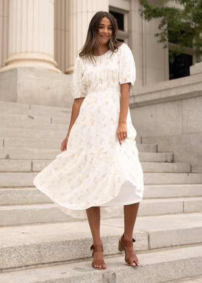 Modest cream floral smocked dress with short sleeves at Lena Layne