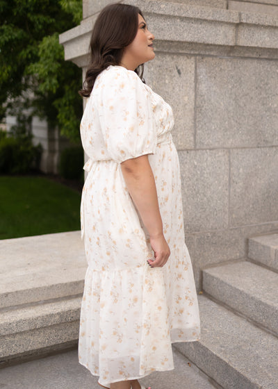 Side view of the cream foral smocked dress in plus size at Lena Layne