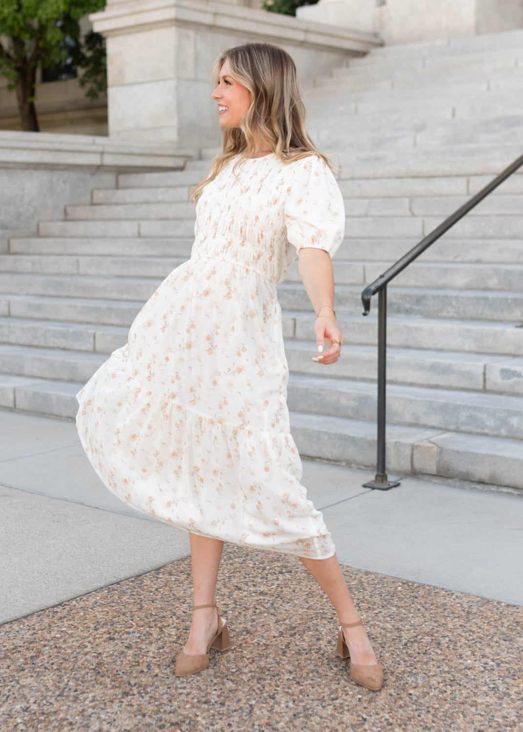 Modest Lena & Lou cream floral smocked dress that is lined and has short sleeves