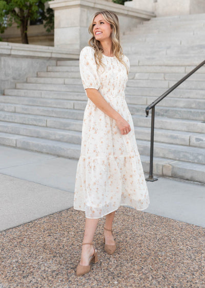 Lena & Lou cream floral smocked dress with short sleeves sold at Lena Layne