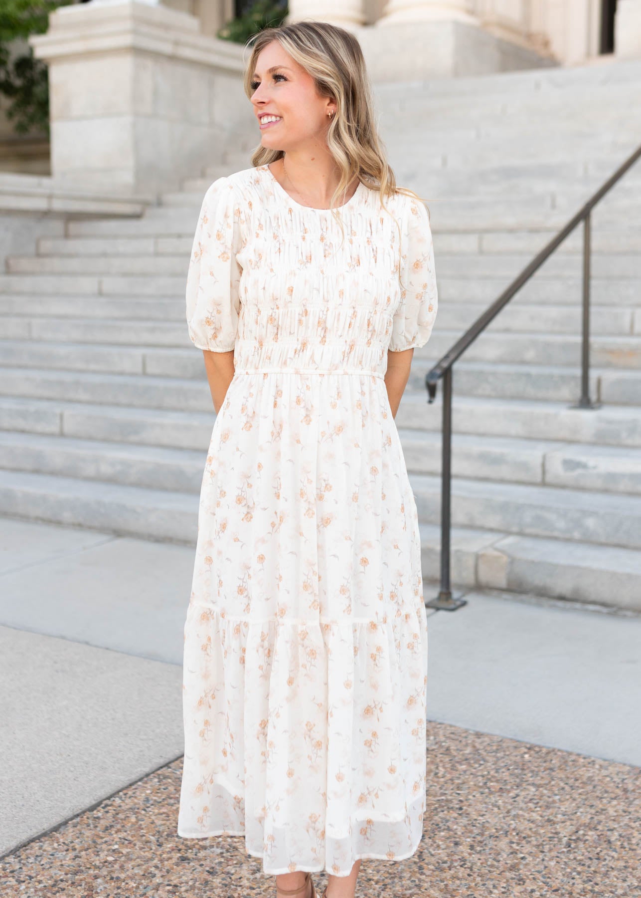 Lena & Lou cream floral smocked dress with short sleeves and smocked front