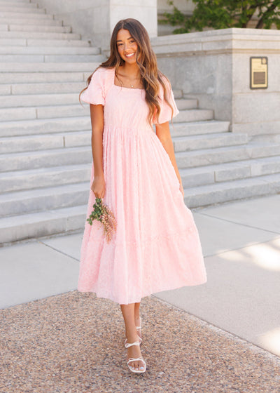 PInk floral textured dress with short sleeves