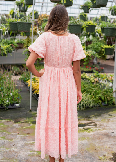 Back view of the pink floral textured dress
