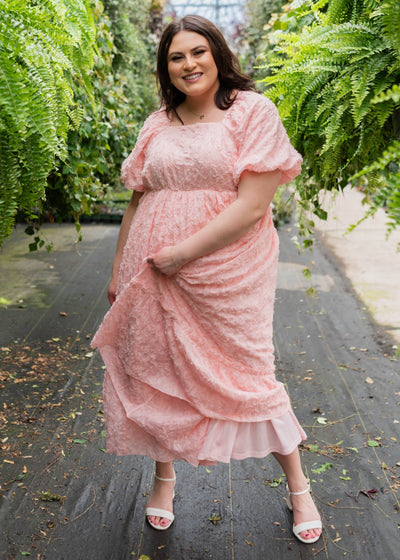 Short sleeve pink floral textured dress in plus size