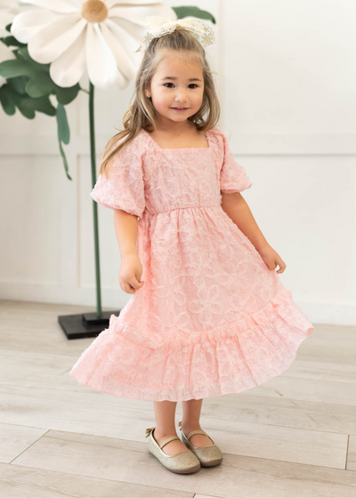 Pink floral textured little girl dress with short sleeves