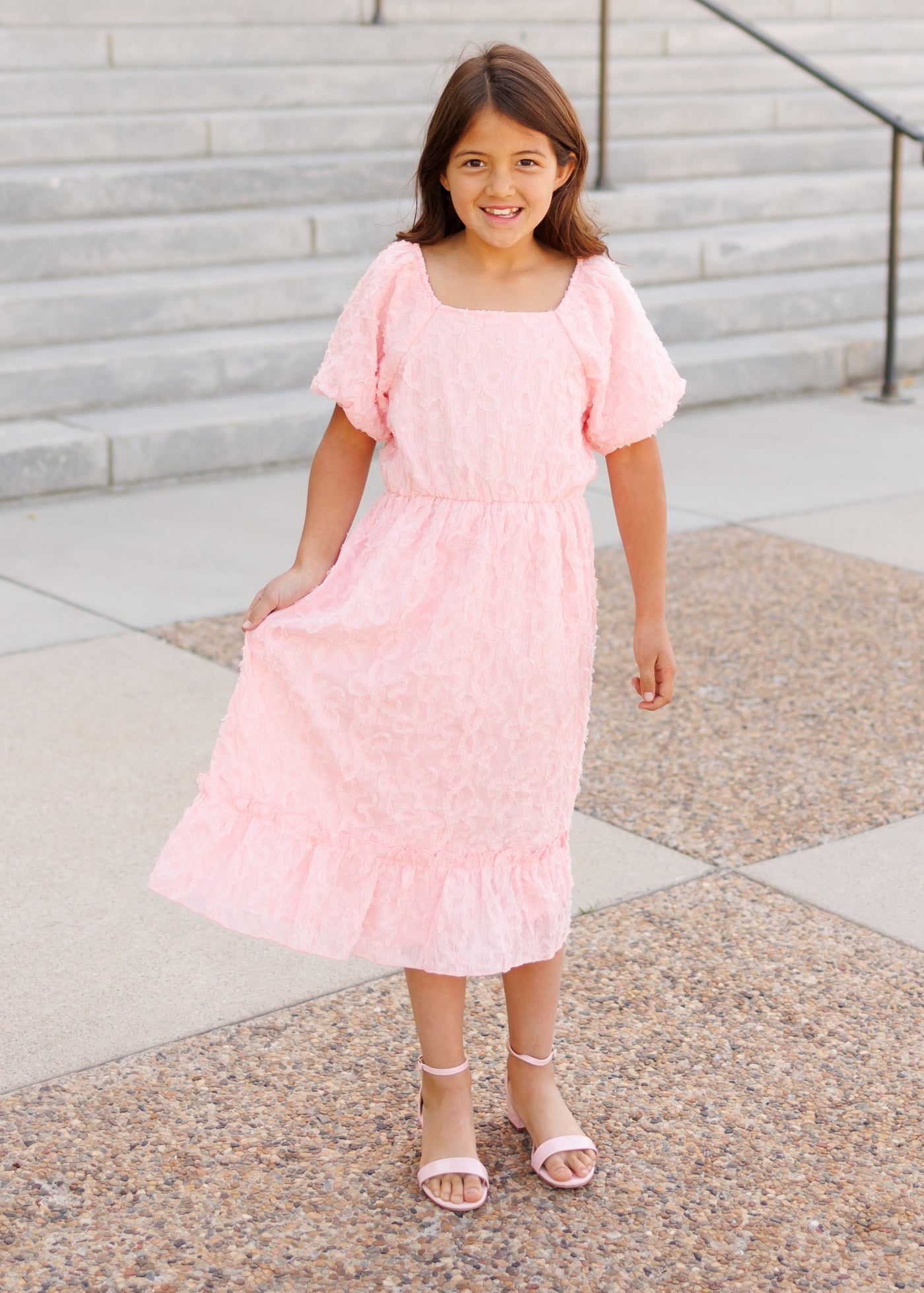Pink floral textured little girl dress with short sleeves