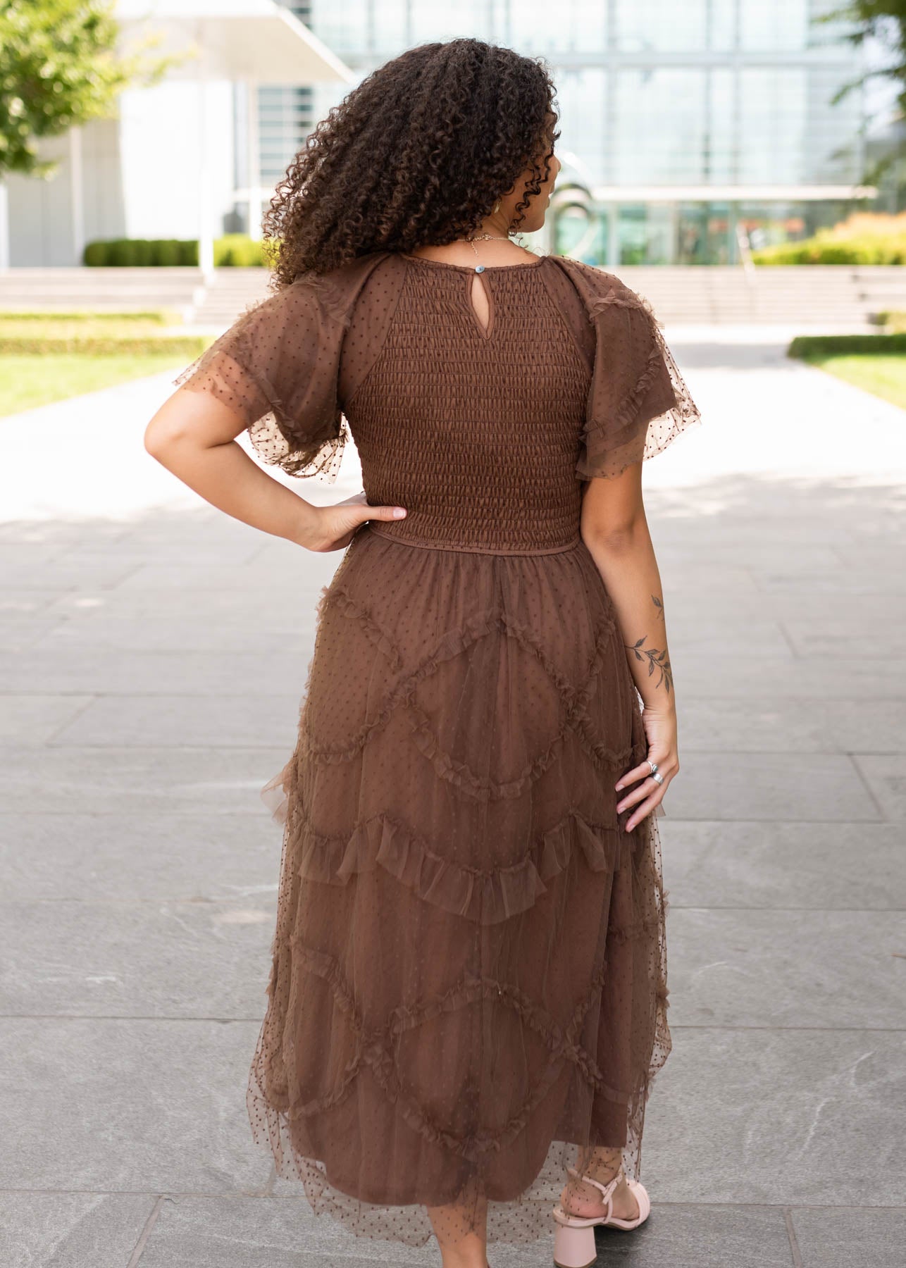 Back view of the brown smocked ruffle dress