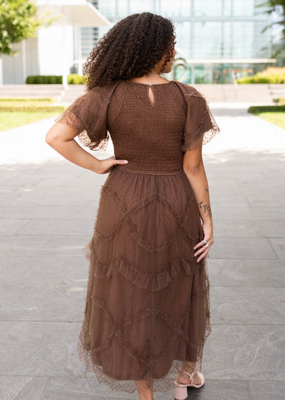 Back view of the brown smocked ruffle dress