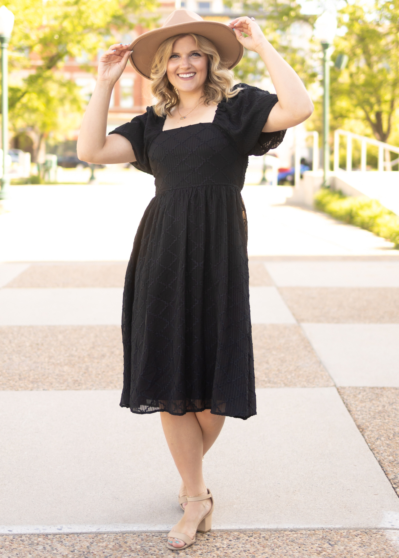 Black dress with short puff sleeves