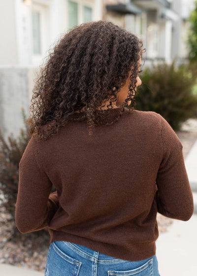 Back view of the brown cardigan