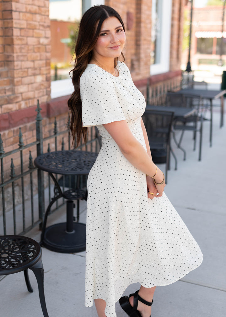 white dress with white polka dots Cassandra Ivory Dot Midi - Flutter Sleeves, Fitted Bodice & Flowy Skirt sku_64279B01-YellowFloralPrint-FO ASOS LUXE bandeau mini Flattering Fit Style:Purple long dress