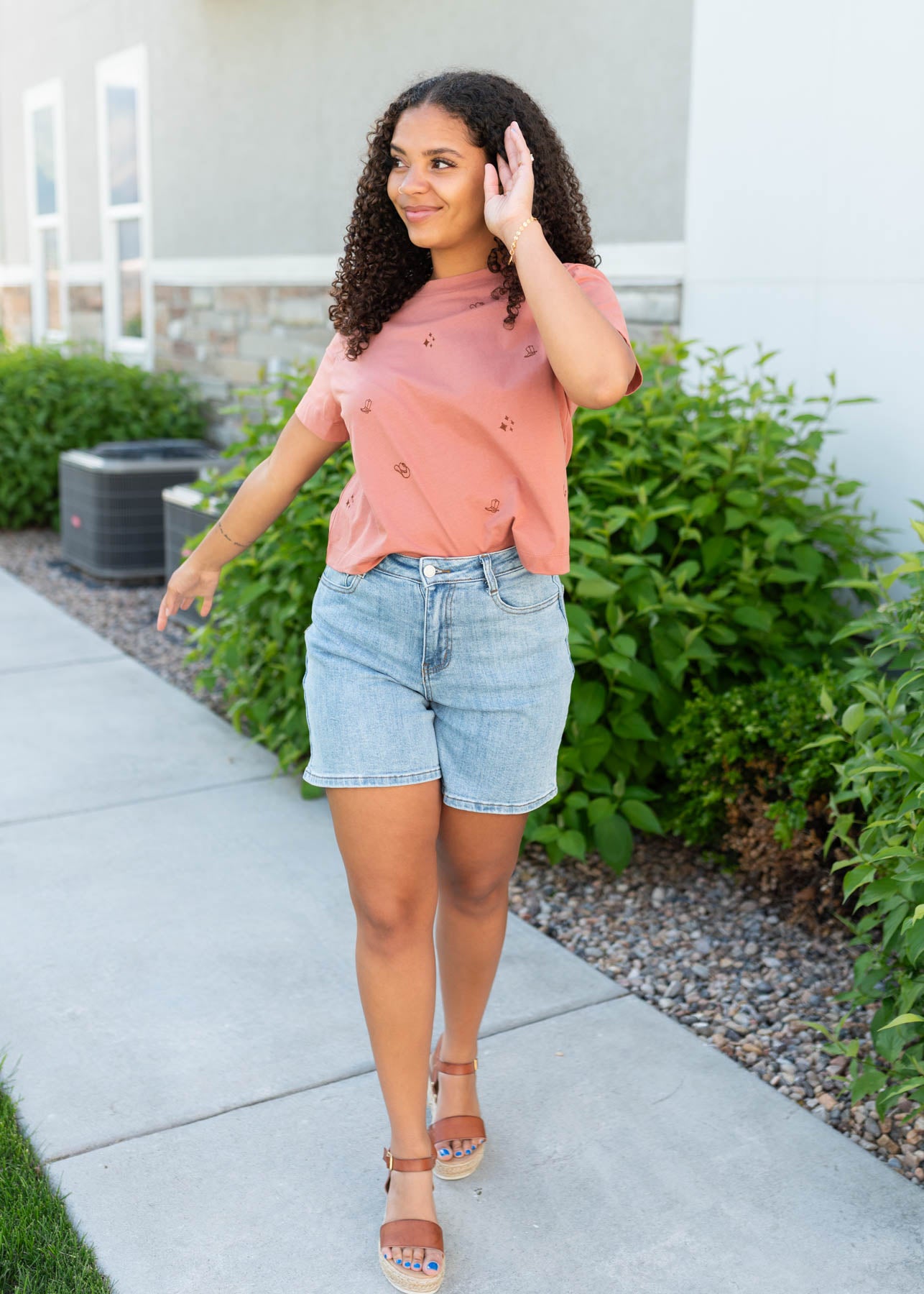 Terracotta cowgirl tee in a size small