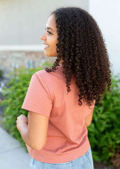 Side view of the terracotta cowgirl tee