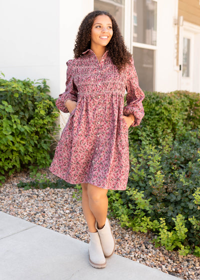 Smocked bodice and pocket on the pink floral dress