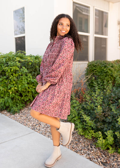 Long sleeve knee length pink floral dress with a collar
