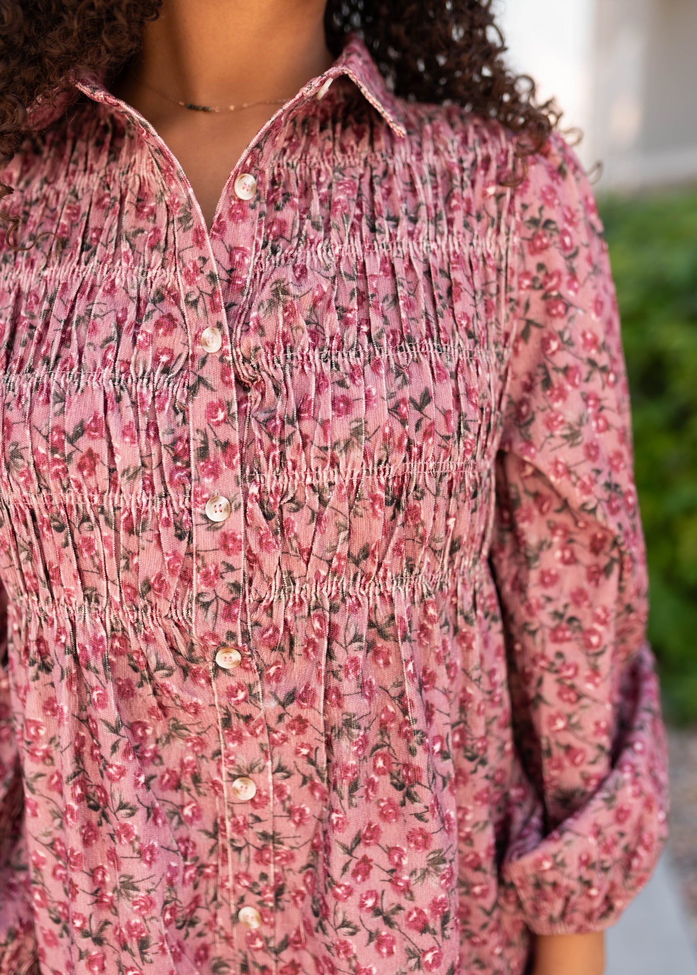 Close up of the smocking on the pink floral dress