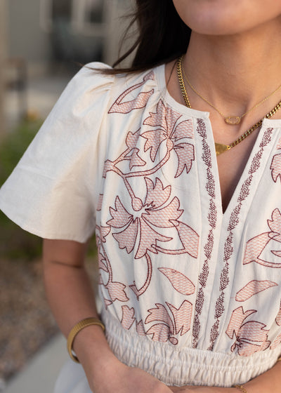 Close up of the embroidery on the natural embroidered dress
