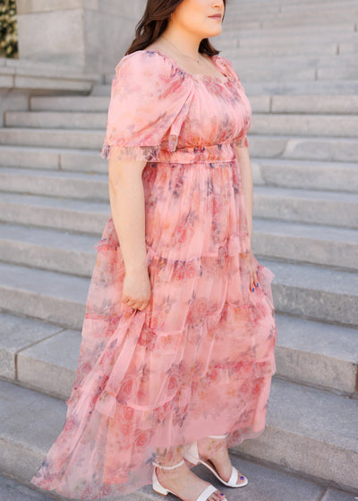 Side view of the pink floral dress in plus size