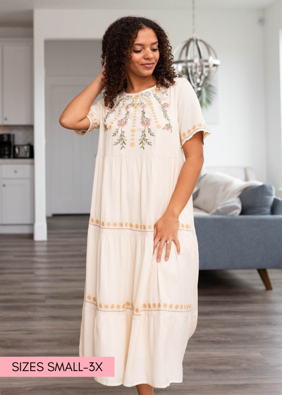Short sleeve cream dress with tiered skirt