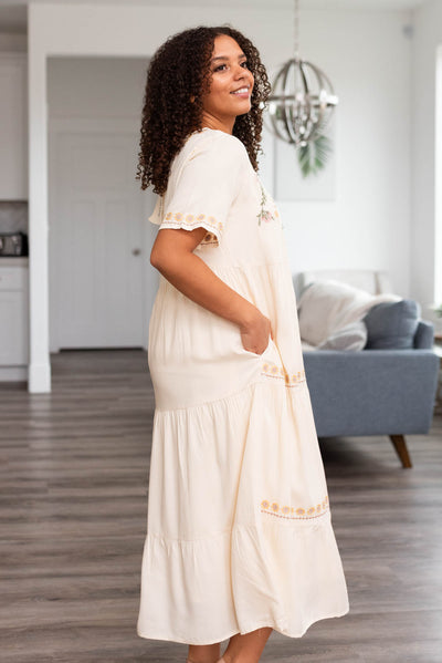 Side view of a cream dress