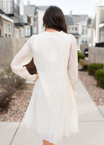 Back view of the ivory button down dress
