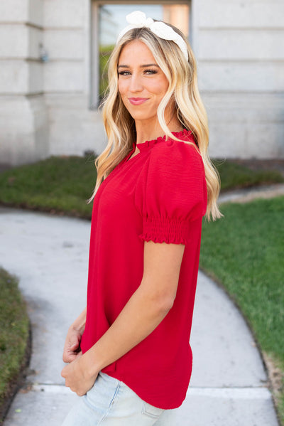 Side view of the red top