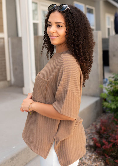 Side view of the light mocha textured top