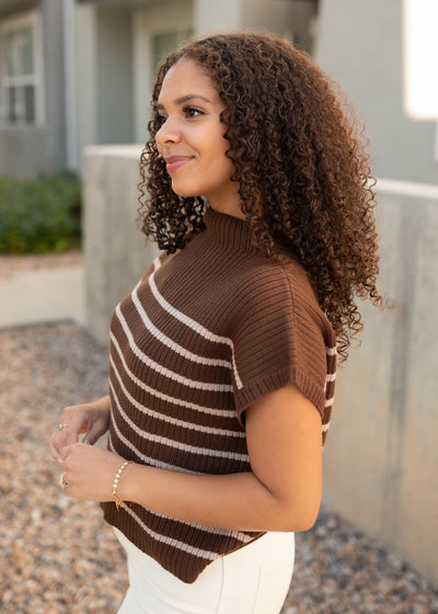 Side view of the modest hazelnut sweater