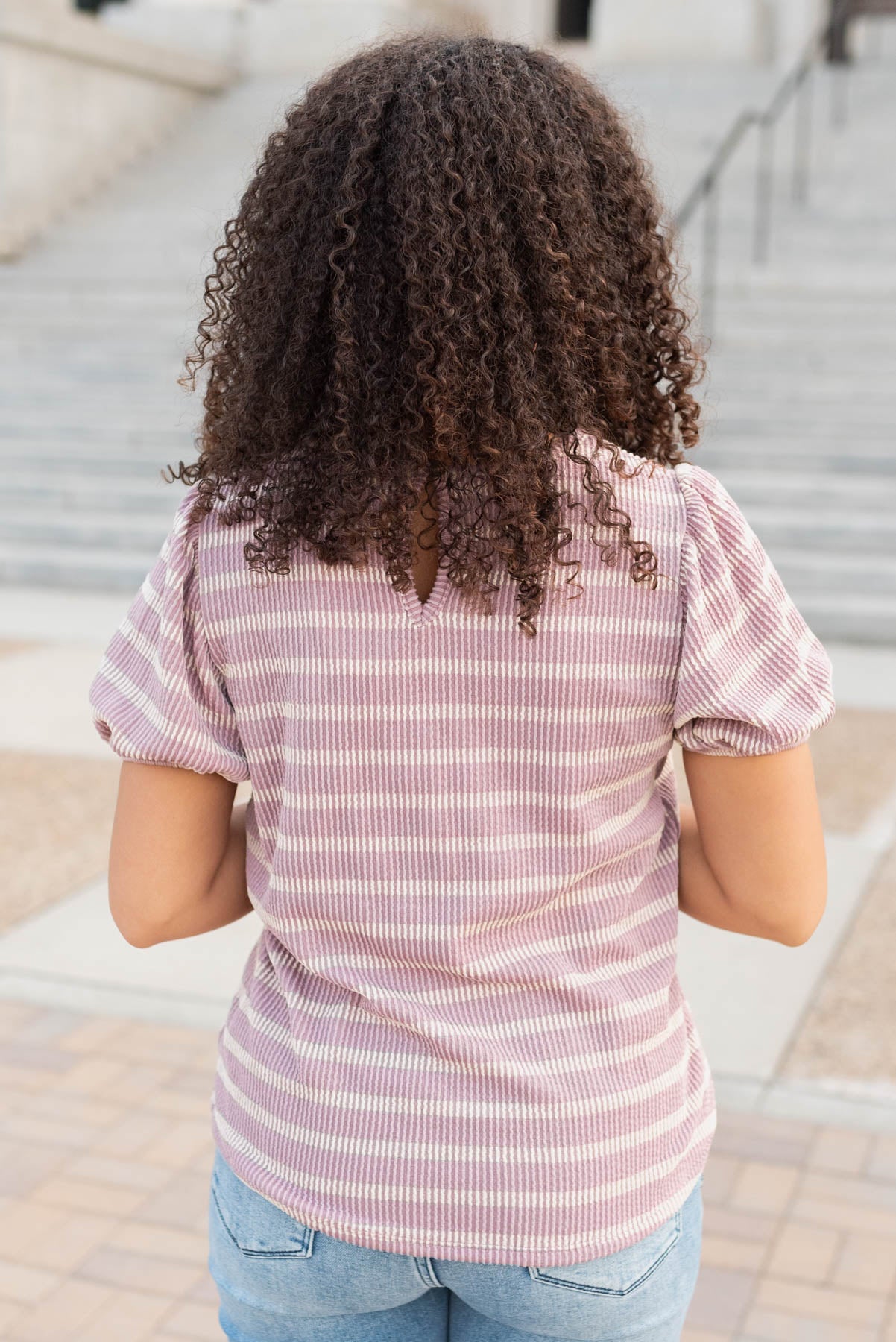 Back view of the pink stripe ribbed top