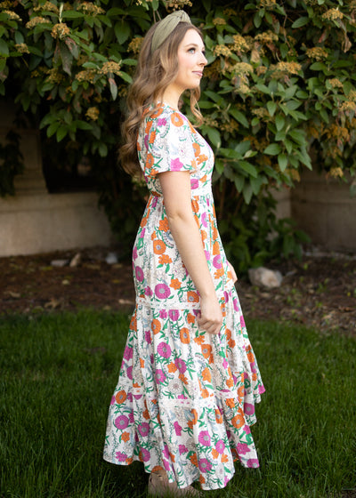 Side view of a tan floral dress
