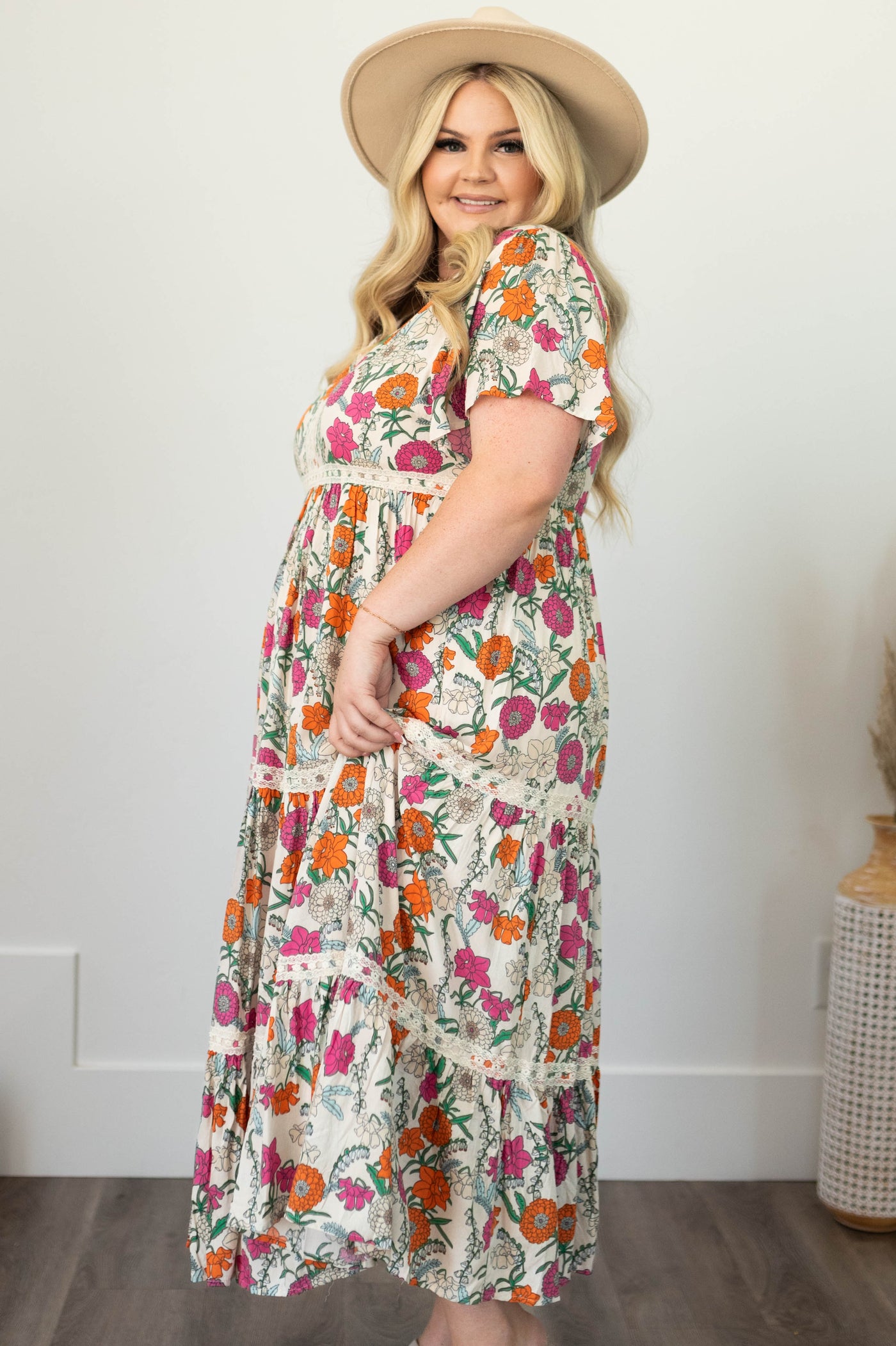 Side view of a tan floral dress