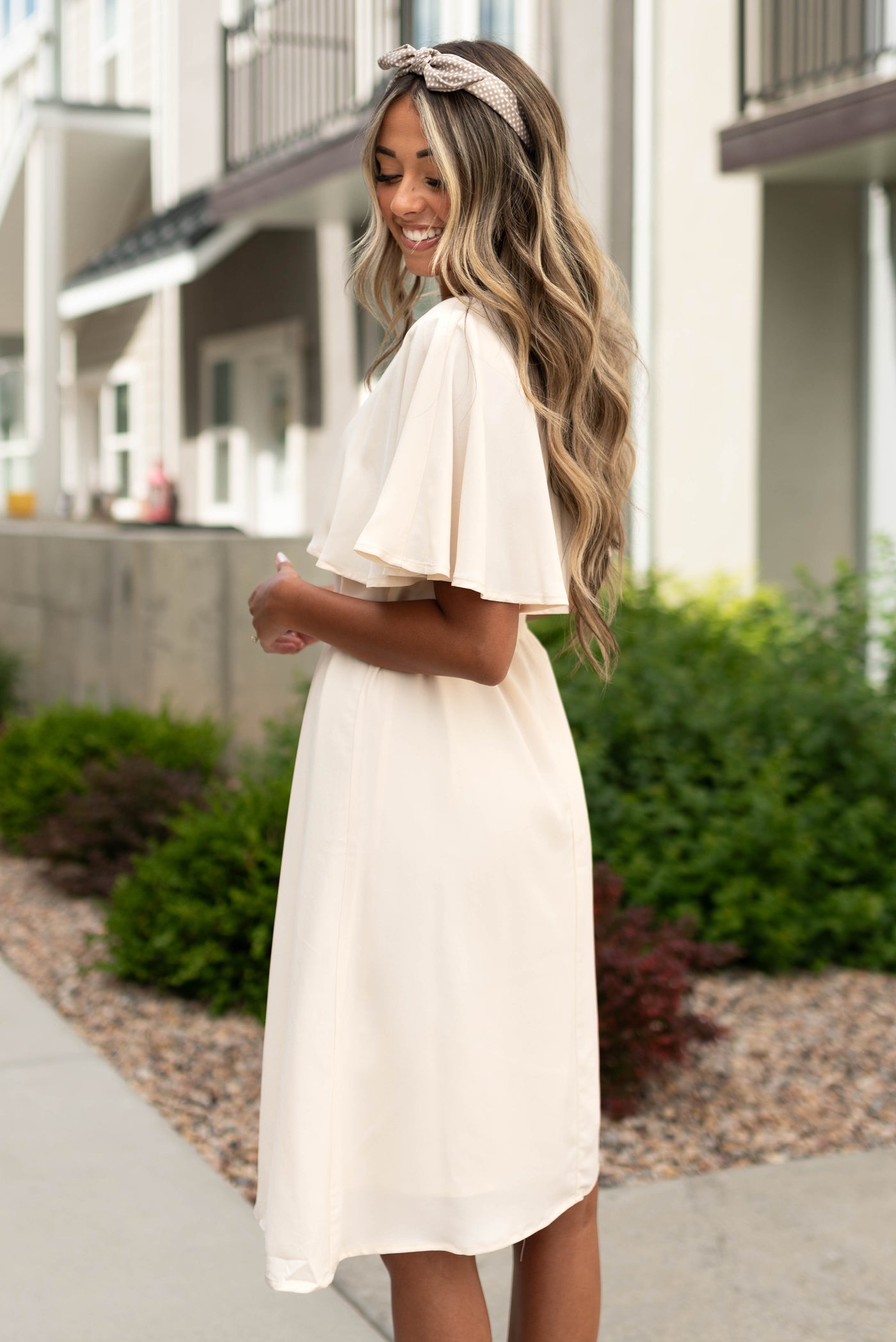 Side view of a cream dress