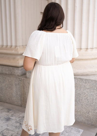 Backview of the ivory embroidered dress in plus size