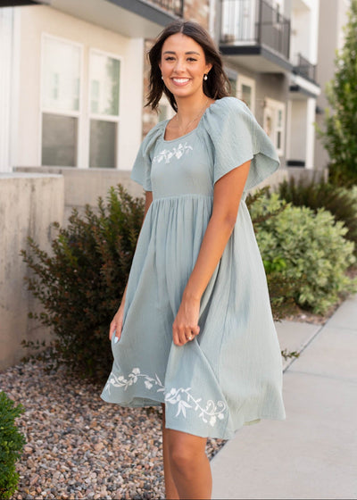 Knee length light sage embroidered dress