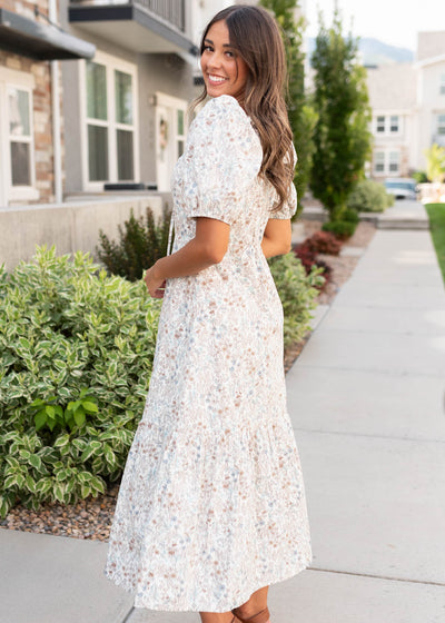 Side view of the cream floral dress at Lena Layne