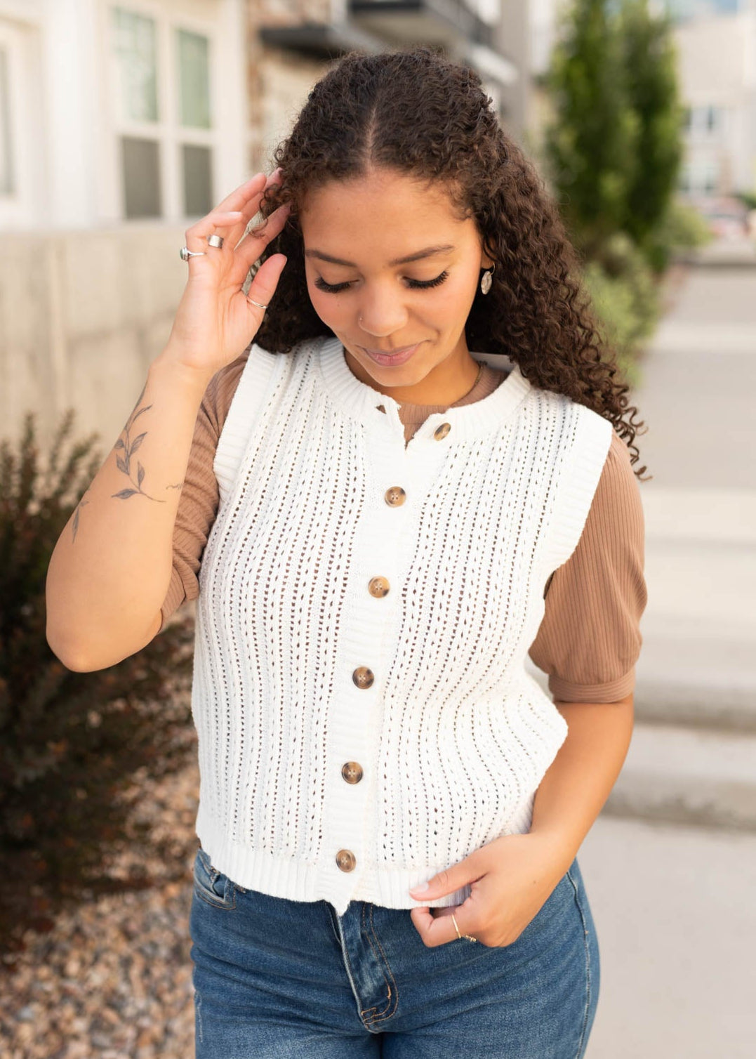 Ivory sweater vest with buttons