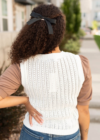Back view of the ivory sweater vest