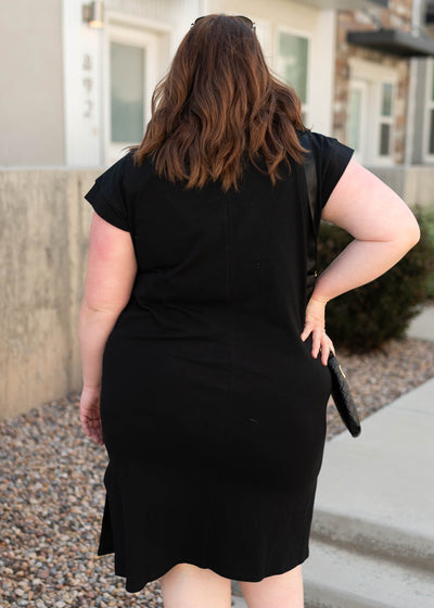Back view of the carbon black dress in plus size